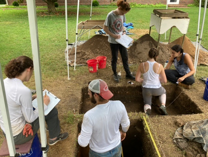 Students digging 