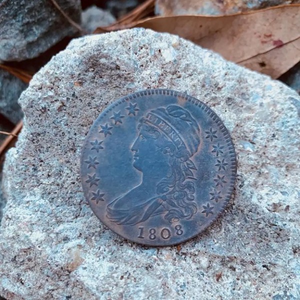 A 1808 coin found in fall 2020 by Julie Schablitsky, an archaeologist with the Maryland State Highway Administration. The coin was one of the first clues that the site of Tubman's former home was nearby. (Julie Schablitsky)