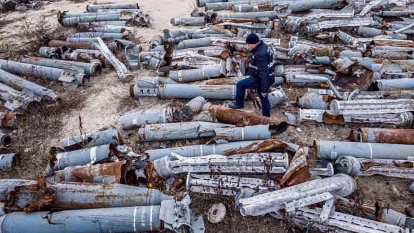 A Ukrainian expert examines the collected remnants of shells and missiles used by the Russian army to attack the Ukrainian city of Kharkiv.