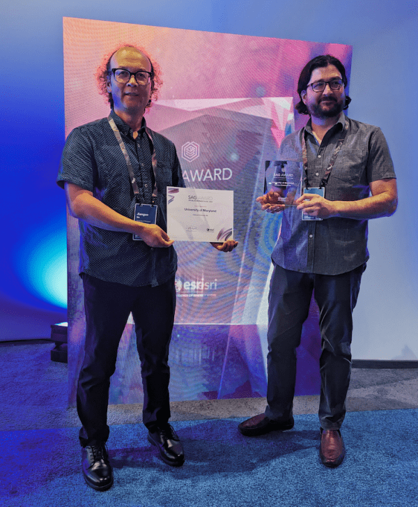 MS Program Director Jack Ma and alum Andrew Newwell  pose with their Usri awards.