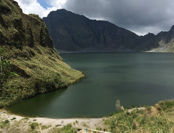 View of crater formation with mountains and lake in the Philippines